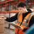 warehouse associate picking and packing orders in distribution center