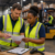 warehouse supervisor evaluating employee performance in warehouse