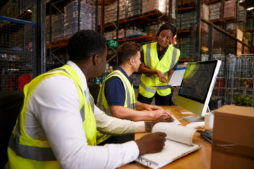 Warehouse leaders reviewing summer workforce planning and staffing needs.