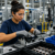 Production associate working on a manufacturing line in a Virginia facility