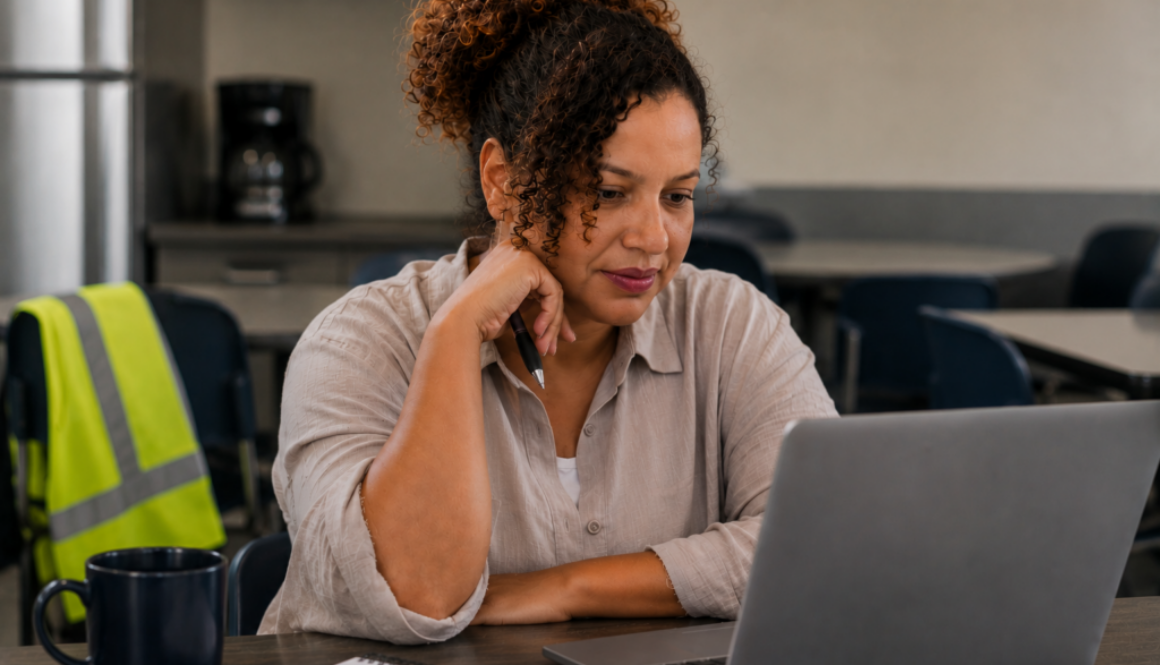 Job seeker reviewing a warehouse job posting on a laptop