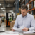 Warehouse operations manager reviewing staffing options in a Virginia facility